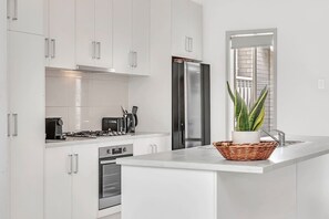 You’ll find all you need in the modern, fully equipped kitchen to cook up a feast, plus a dishwasher for easy clean-up. 
