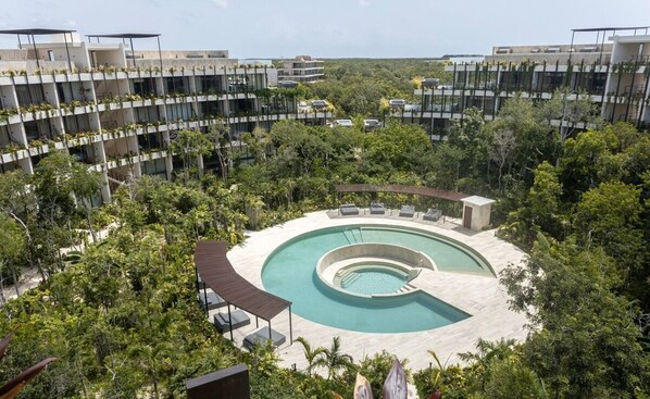 Explore the beautiful complex with ground pool.