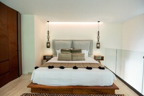 Relax in your comfortable upstairs bedroom.