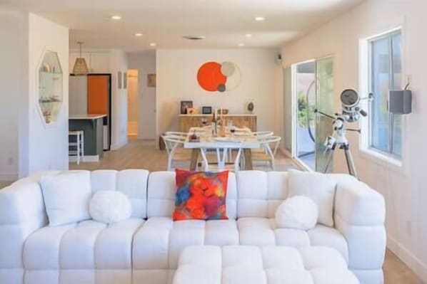 Large open floor plan with designer furnishings and plenty of room for everyone to come together.