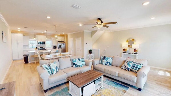 Spacious kitchen, dining, living space.