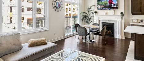 Second Floor Living Room with Breakfast Nook and Gas Fireplace 