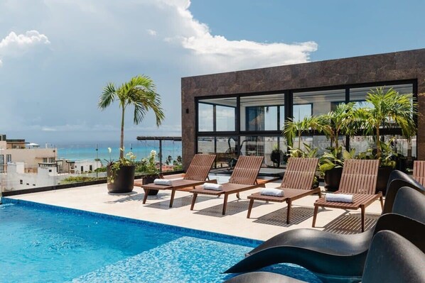 The sun loungers are calling your name to come enjoy Playa the Perfect Place way!