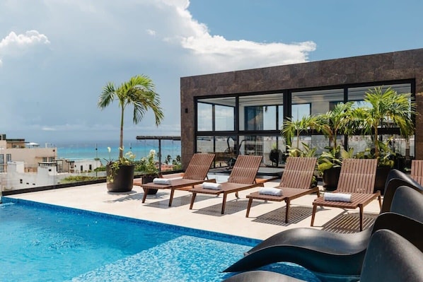 The sun loungers are calling your name to come enjoy Playa the Perfect Place way!