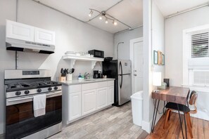 This well-lit and equipped kitchen will make your food a lot more flavorful! 