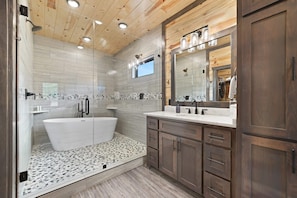 Master bathroom with soaking tub and shower.