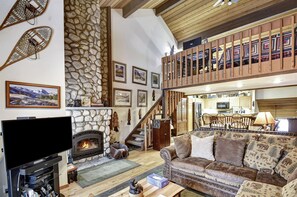 Living room with wood buring fireplace