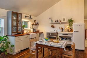 English Cottage inspired kitchen with all new appliances and coffee/tea station.