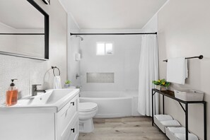 Pamper yourself in this spacious, spa-like bathroom, designed for relaxation and rejuvenation. Enjoy the elegant features and ample room that create a tranquil retreat for your daily self-care.