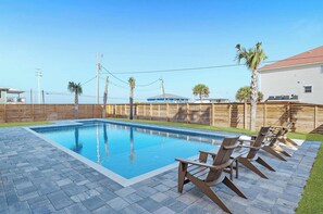 Fenced-in back yard with private pool