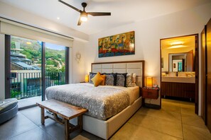 The comfortable master bedroom has a king size bed, ensuite bathroom and ample closet space