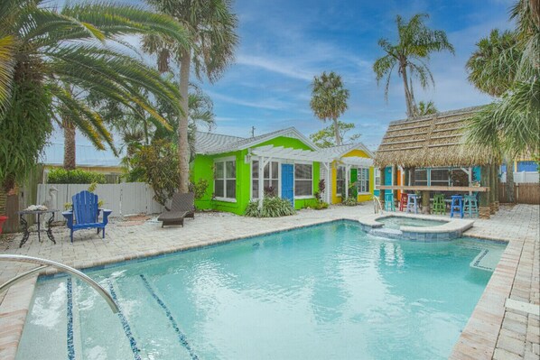 View of pool and entrance.