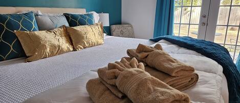 Soft bath towels, face towels, and hand towels are provided for every guest.