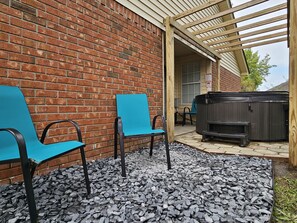 Plenty of outdoor space to hang out, play games, grill, and enjoy the hot tub.