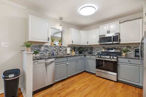 Cook and savor in our gourmet kitchen. Our kitchen has all basic utensils such as pots, pans, oven, blender, coffee maker etc. 
