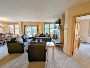 Spacious living room with plenty of seating for everyone!