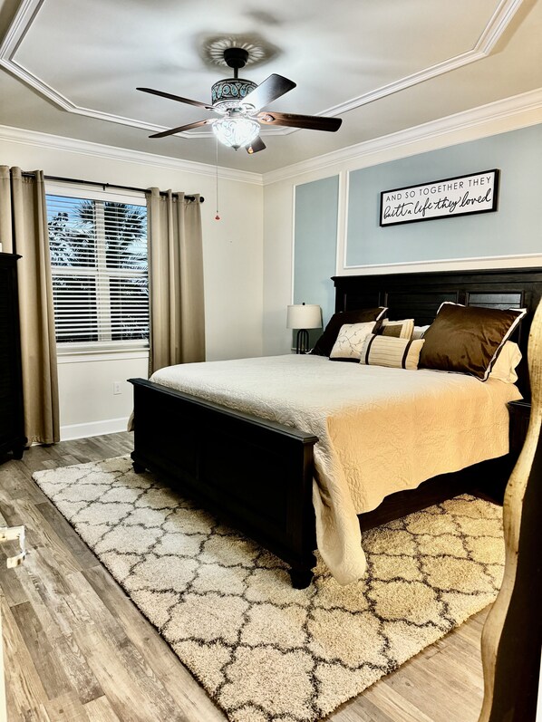 Downstairs Master Bedroom with King bed and 55”tv.