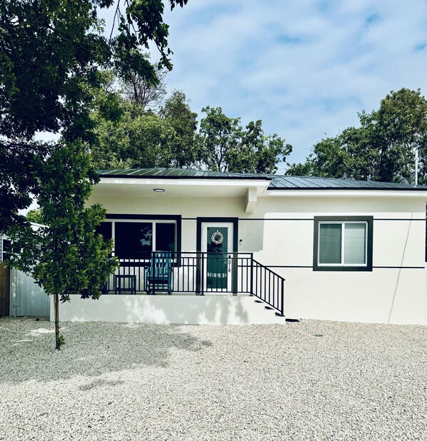 2023 construction with metal roof, impact windows and door and new everything!
