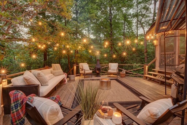 Bask in the boundless beauty of seasonal mountain views on this spacious deck.