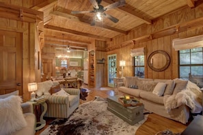 Embrace a cozy open floor plan, where rustic elegance meets modern comfort.