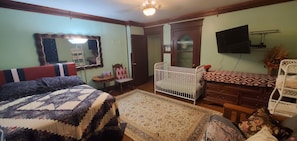 Master bedroom upstairs 1 double bed 1 double futon 1 baby crib