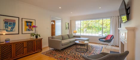 Bright and spacious living room with large picture window