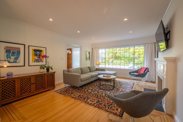 Bright and spacious living room with large picture window