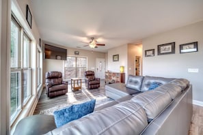 Watch a movie with the whole family on the spacious sectional!