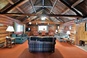 Beamed ceiling and log accents