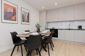 The fully equipped kitchenette includes everything you need for a home-cooked meal.
