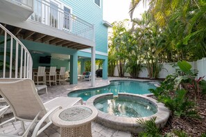 Lounge by the spa in this peaceful outdoor area.