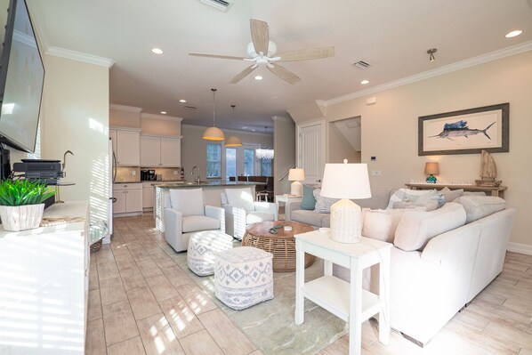 Enjoy this beautiful family room with side by side glider rockers.