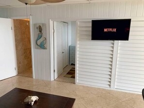 Living room with Netflix on TV