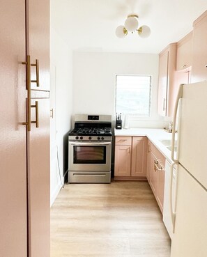 50’s vintage. modern amenities stove & full size fridge!