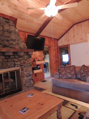 Living room, looking into the kitchen.