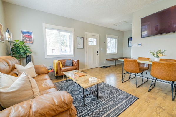 The living room area that offers ample seating and entertainment.