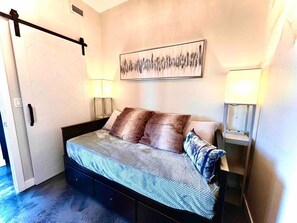 This tiny room is very functional. The bed expands to king size with very comfortable memory foam mattress.