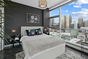 Main bedroom with a comfy queen size bed and an incredible view