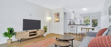 Living area with flat screen TV, the perfect space to relax