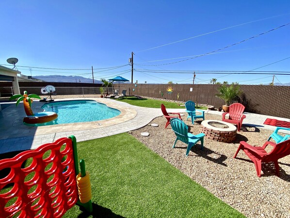 Backyard fun 4 the whole fam!  Pool, fire pit and space to spread out and play.