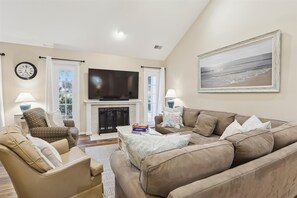 As you enter your second-story retreat, the open floor plan unfolds, seamlessly connecting the living, dining, and kitchen areas.