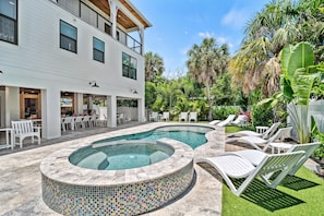 Patio with Private Heated Pool & Spa surrounded with chaise lounges and seating with the Lanai overlooking.