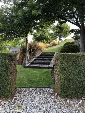 Steps to our private back garden and lawn.