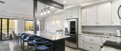 Beautiful renovated kitchen with island bar