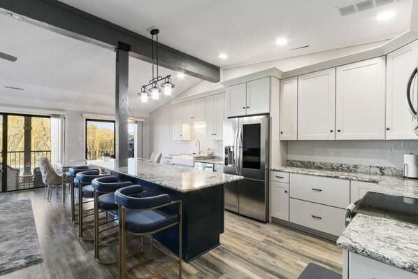 Beautiful renovated kitchen with island bar