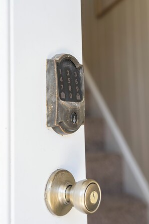 Secure with passcode enabled door lock