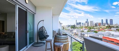 A generous balcony offers a private setting to enjoy your morning coffee or an afternoon glass of wine while you take in views overlooking the city. 
