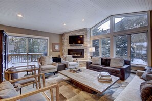 Living Room w Mountain Views Features Fire Place