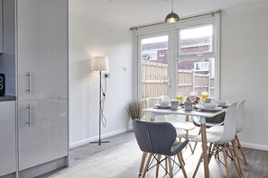 Enjoy views of the fenced garden from the dining area