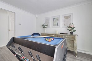 Be entertained with pool or foosball